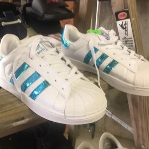Adidas NWT and a pair that is NWOT